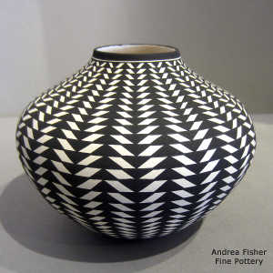 Geometric design on a black and white jar