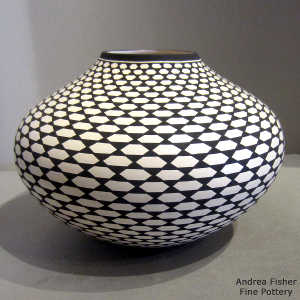 Geometric design on a black and white jar