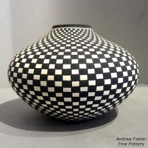 Checkerboard design on a black and white jar