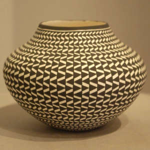 Geometric design on a black and white jar