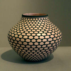 Geometric design on a black and white jar