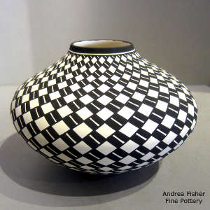 Geometric design on a black and white jar