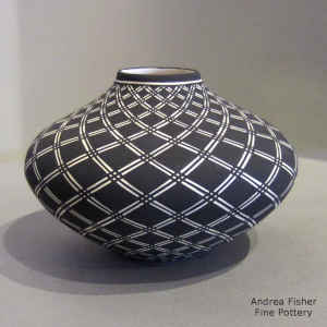 Geometric design on a black and white jar