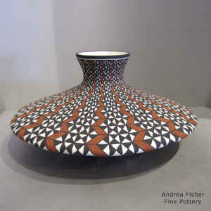 Geometric design on a black and white jar