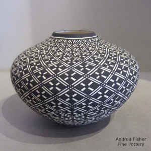 Geometric design on a black and white jar