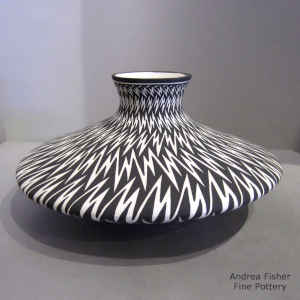 Lightning bolt design on a black and white jar