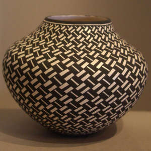 Geometric design on a black and white jar
