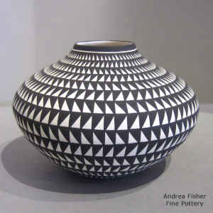 Geometric design on a black and white jar