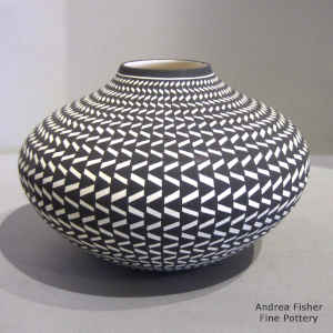 Geometric design on a black and white jar