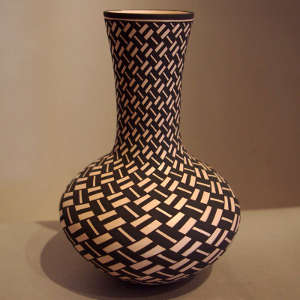 Black and white geometric design on a tall-necked jar