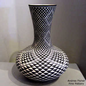 Geometric design on a tall neck black and white vase