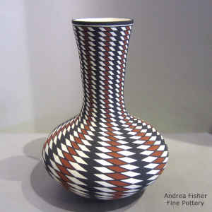 Polychrome vase with a spiral checkerboard geometric design