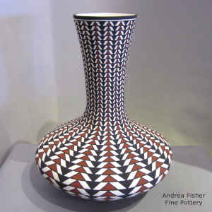 Polychrome vase with a geometric design