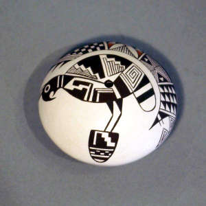 Parrot and geometric design on a polychrome seed pot