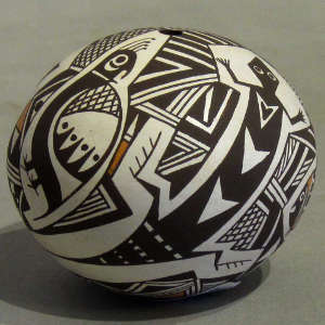 Mimbres and geometric designs on a polychrome seedpot