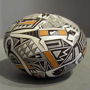 Mimbres and geometric designs on a polychrome seedpot