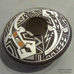 Mimbres lizard and geometric designs on a polychrome seedpot