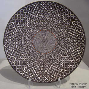 Swirl, fine line and geometric design on a polychrome plate