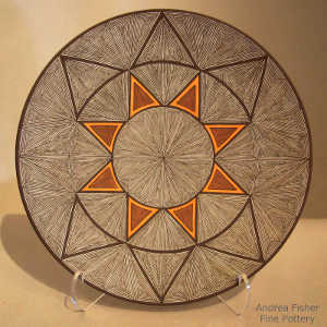 Fine line and geometric design on a polychrome plate