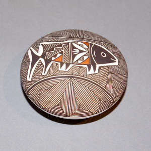 Mimbres fish and fine line design on a polychrome seed pot