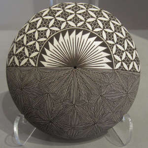 Fine line and geometric design on a black and white seed pot