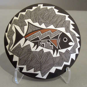 Fish, fine line and geometric design on a polychrome seedpot