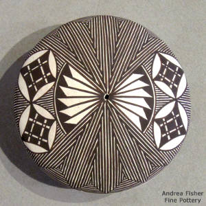 Fine line and geometric design on a black and white seedpot