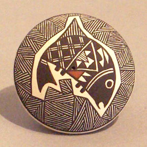 Mimbres-style fish and fine line design on a polychrome seed pot
