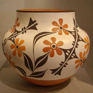 Floral and geometric designs on a polychrome jar