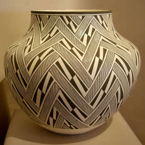 Lightning and rain design on a black and white jar