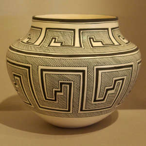 Maze, kiva step and fine line design on a black and white jar