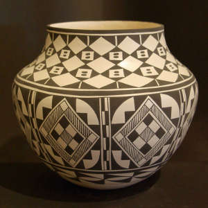 Geometric designs on a black and white jar