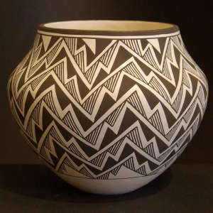 Lightning and rain design on a black and white jar