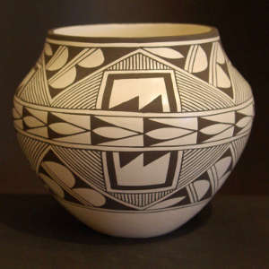 Rain and geometric design on a black and white jar