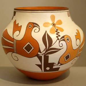 Parrot, floral and geometric design on a polychrome jar