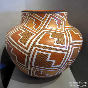 Interlocking kiva step, rain and geometric design on a polychrome jar