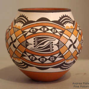 Rainbow, medallion and geometric design on a polychrome jar