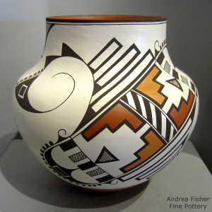 Cloud, kiva step, bird element and geometric design on a polychrome jar