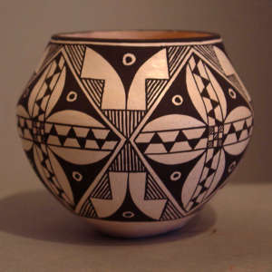 Medallion and geometric design on a polychrome jar