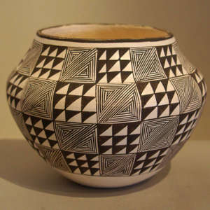 Fine line and stepped designs on an olla