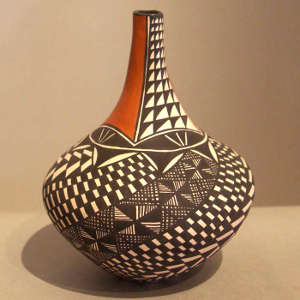 Geometric design on a tall-necked polychrome jar