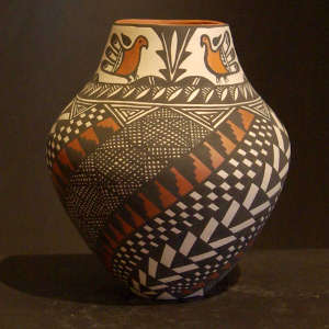Parrot and geometric design on a polychrome jar
