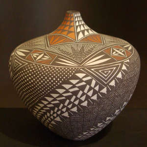 Geometric design on a polychrome tear-shaped jar