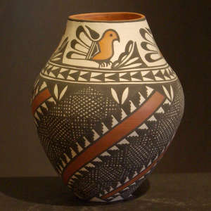 Parrots and swirl geometric design on a polychrome jar