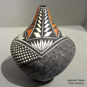 Geometric design on a polychrome tear drop jar