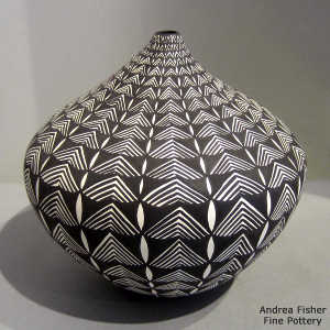 Geometric design on a black and white tear drop jar