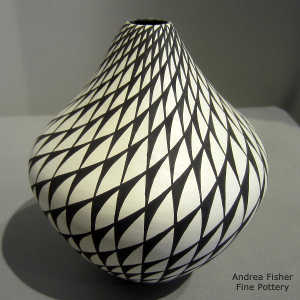 Geometric design on a black and white jar