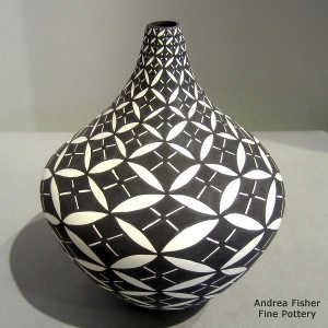 Geometric design on a black and white tear drop jar