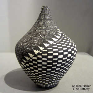 Geometric design on a black and white tear drop jar