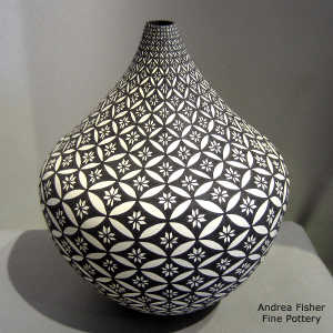 Geometric design on a black and white tear drop jar